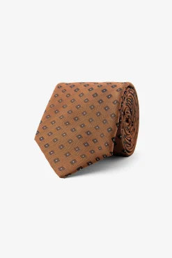 Cravatta micro fantasia geometrica arancio
