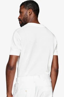Polo in maglia armaturata panna