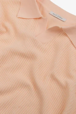 Polo in maglia collo aperto armaturata pesca