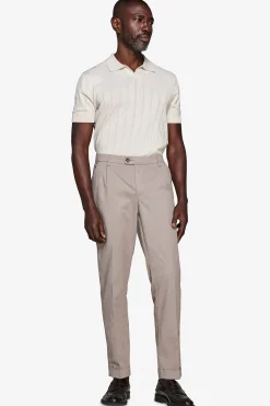 Polo in maglia costa piatta sabbia