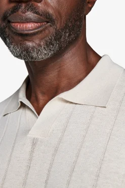 Polo in maglia costa piatta sabbia