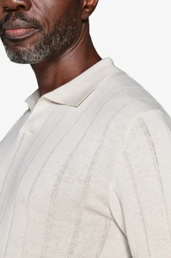 Polo in maglia costa piatta sabbia