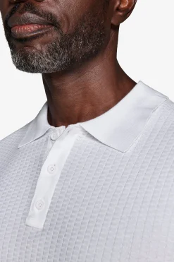 Polo in maglia punto dadino bianca