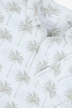 Polo piquet stampa palme panna