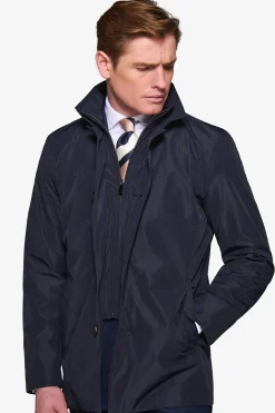 Trench con pettorina navy